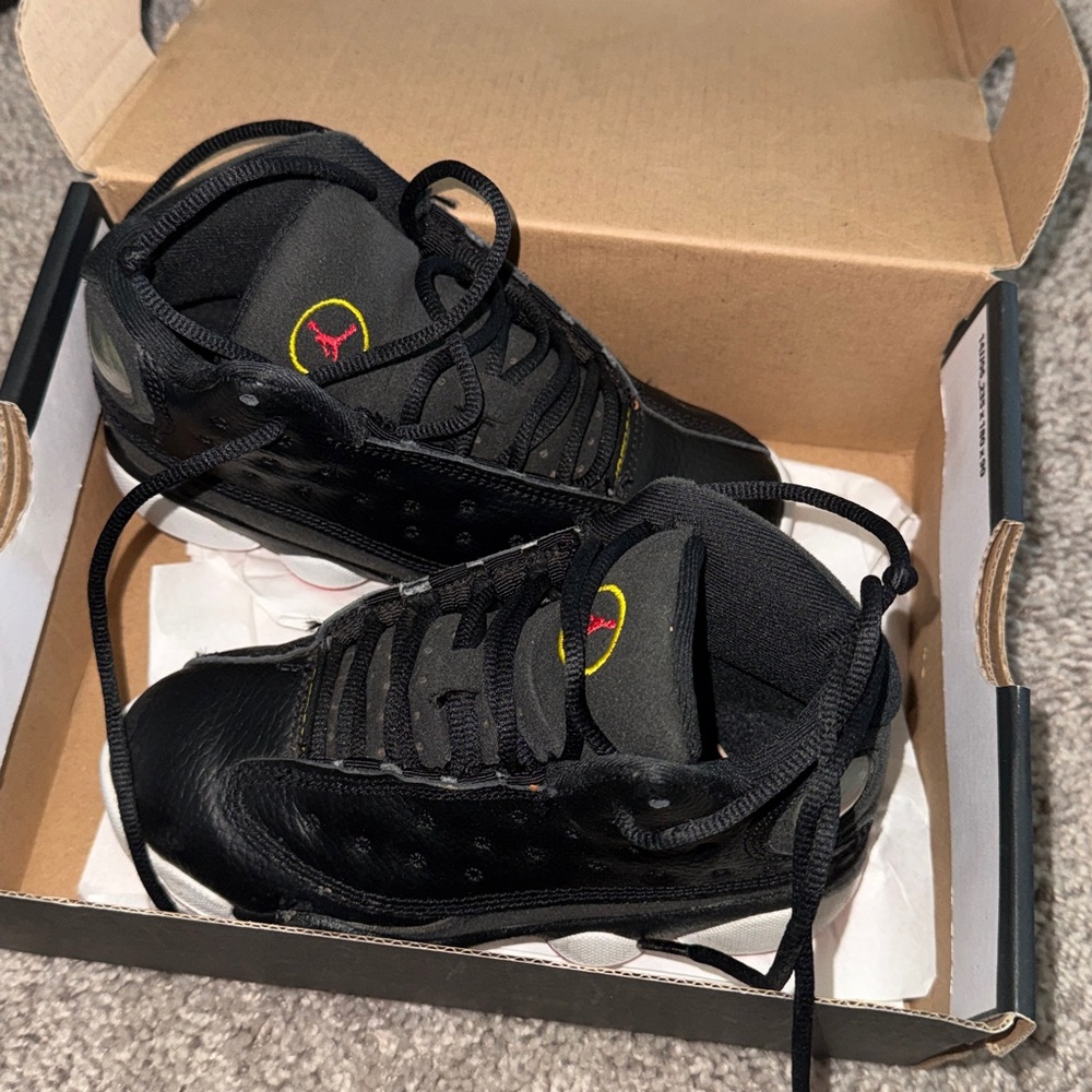Black and Red Air Jordan Sneakers worn before